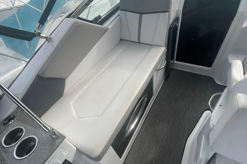 Slide: The Image of Interior of 2019 Four Winns Vista 275 boat with sleek seating and modern design. - 42