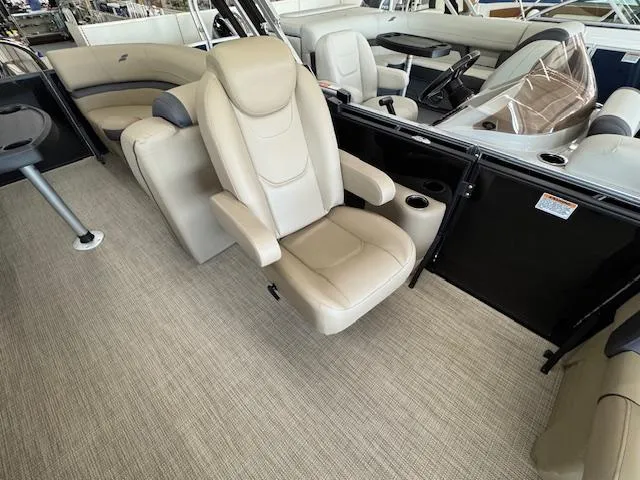 Slide: The Image of Luxurious interior of 2025 Starcraft EXS 1 boat with beige seating and modern design. - 12