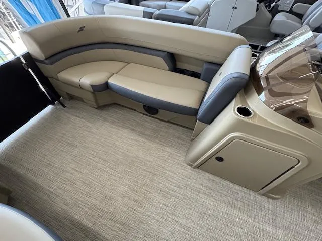 Slide: The Image of Luxurious interior of 2025 Starcraft EXS 1 boat with beige seating and modern design. - 5