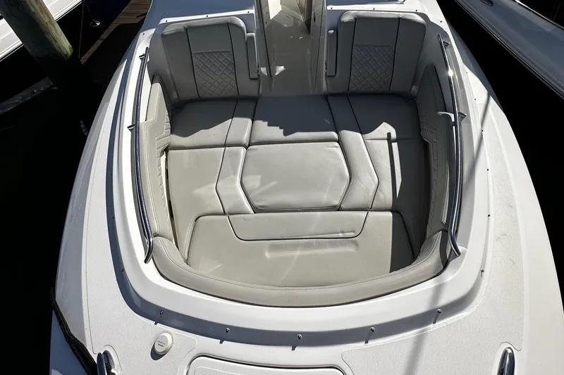 Slide: The Image of 2022 Pursuit DC 295 Dual Console boat with spacious bow seating area. - 18