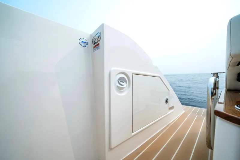 Slide: The Image of Tiara Yachts 48 LE 2025, sleek deck design with ocean view. - 15