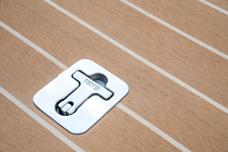 Slide: The Image of Tiara Yachts 48 LE 2025 deck detail with sleek metal fixture. - 25