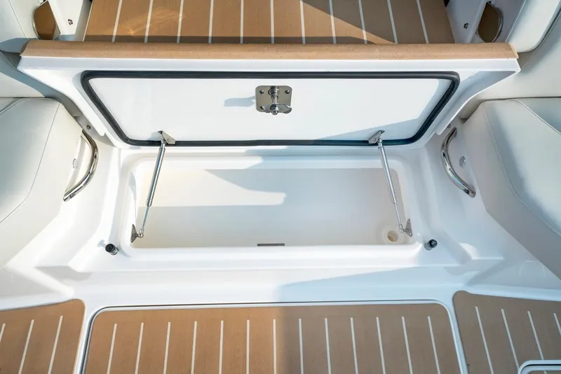 Slide: The Image of Open storage compartment on 2025 Tiara Yachts 48 LE boat deck. - 28