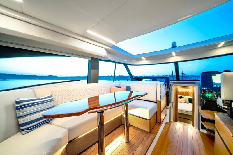 Slide: The Image of Luxurious interior of 2025 Tiara Yachts 48 LE with elegant seating and modern design. - 35