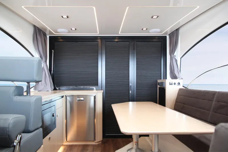 Slide: The Image of Luxurious interior of 2025 Skamander Monaco Coupe with modern seating and sleek design. - 9