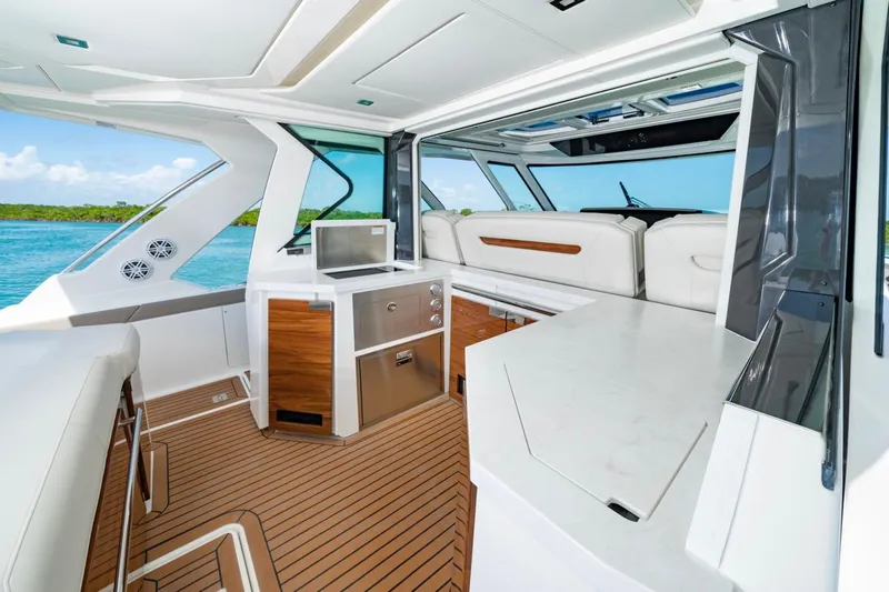 Slide: The Image of Luxurious interior of 2025 Tiara Yachts 48 LS with modern amenities and sleek design. - 10