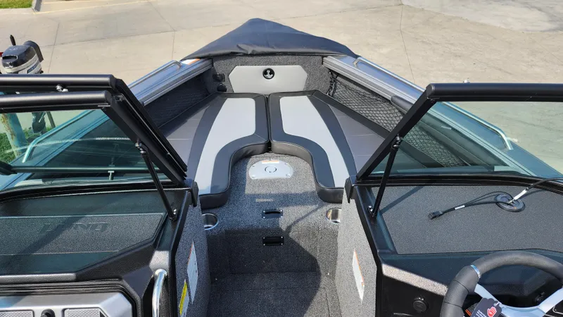 Slide: The Image of 2025 Lund 1875 Tyee boat interior with sleek seating and modern design. - 14