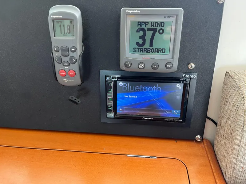 Slide: The Image of Control panel of a 2007 Lagoon 420 yacht with navigation and Bluetooth stereo. - 19