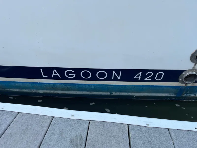 Slide: The Image of Lagoon 420 catamaran, 2007 model, docked at marina. - 5