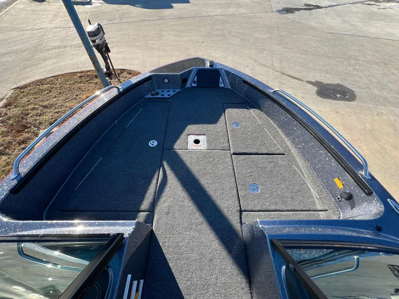 Slide: The Image of 2025 Lund 189 Pro-V GL boat deck, featuring spacious storage and sleek design. - 21