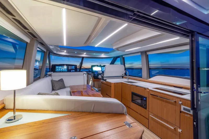 Slide: The Image of Luxurious interior of 2025 Tiara Yachts EX 54 with modern amenities and panoramic views. - 30