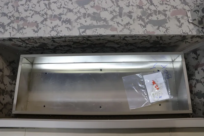 Slide: The Image of War Eagle 648LDSV 2025 storage compartment with camouflage interior and accessory bag. - 14