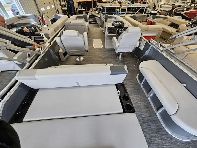 Slide: The Image of Interior of 2025 Godfrey Sweetwater 2286 SFL pontoon boat with modern seating and helm. - 8