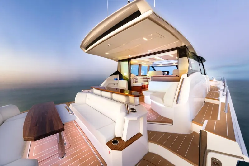 Slide: The Image of Luxurious 2025 Tiara Yachts EX 60 with elegant deck and modern interior design. - 22