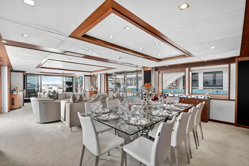 Slide: The Image of Luxurious interior of 2010 Sunseeker 40 Metre Yacht with elegant dining area and modern decor. - 11