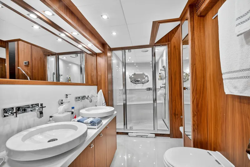 Slide: The Image of Luxurious bathroom on 2010 Sunseeker 40 Metre Yacht with wood accents and modern fixtures. - 18