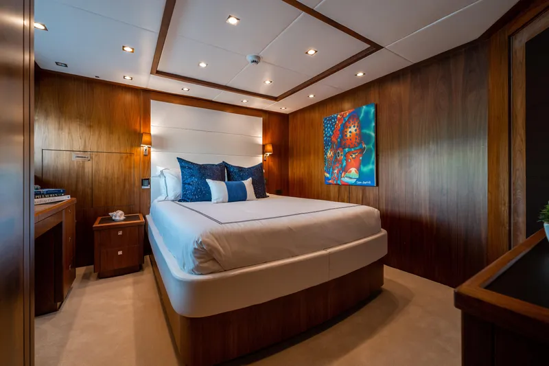 Slide: The Image of Luxurious bedroom interior on 2010 Sunseeker 40 Metre Yacht with modern decor and artwork. - 22