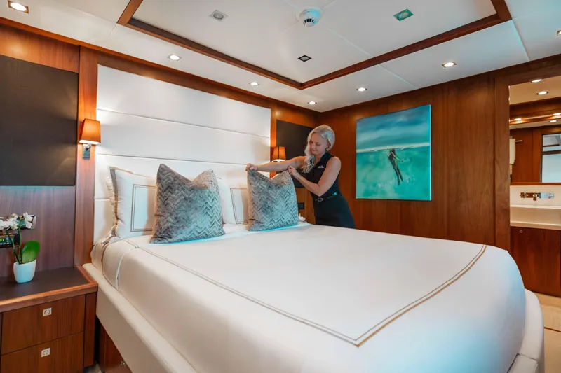 Slide: The Image of Luxurious bedroom on 2010 Sunseeker 40 Metre Yacht with elegant decor and modern amenities. - 24