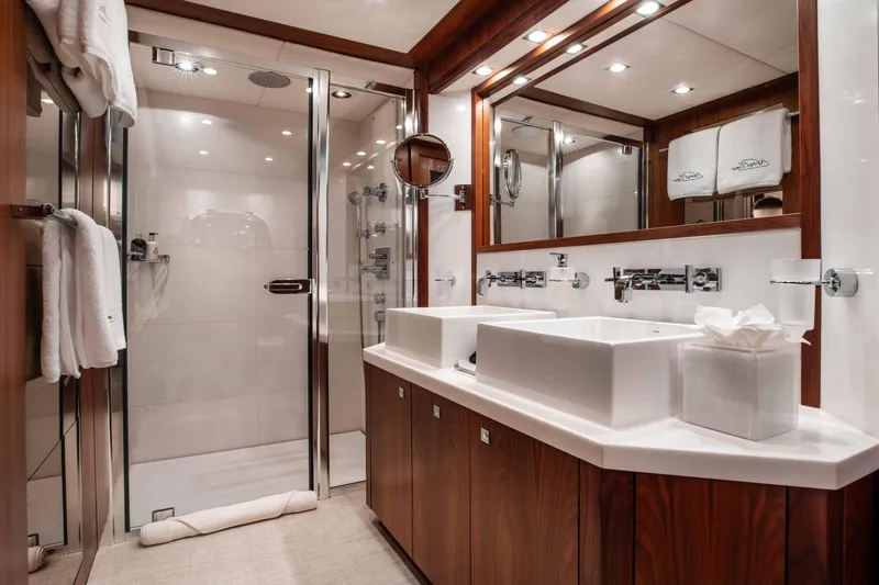 Slide: The Image of Luxurious bathroom on 2010 Sunseeker 40 Metre Yacht with dual sinks and glass shower. - 25