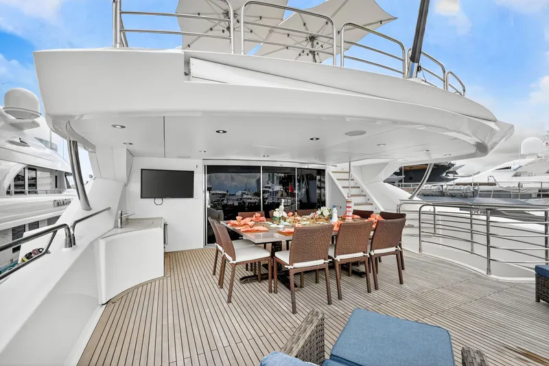 Slide: The Image of Luxurious Sunseeker 40 Metre Yacht 2010 with elegant outdoor dining area and modern amenities. - 35