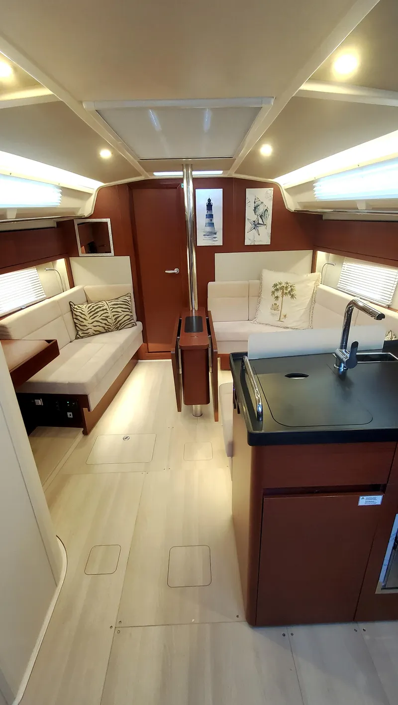 Slide: The Image of Luxurious interior of 2024 Hanse 388 yacht with modern furnishings and sleek design. - 10