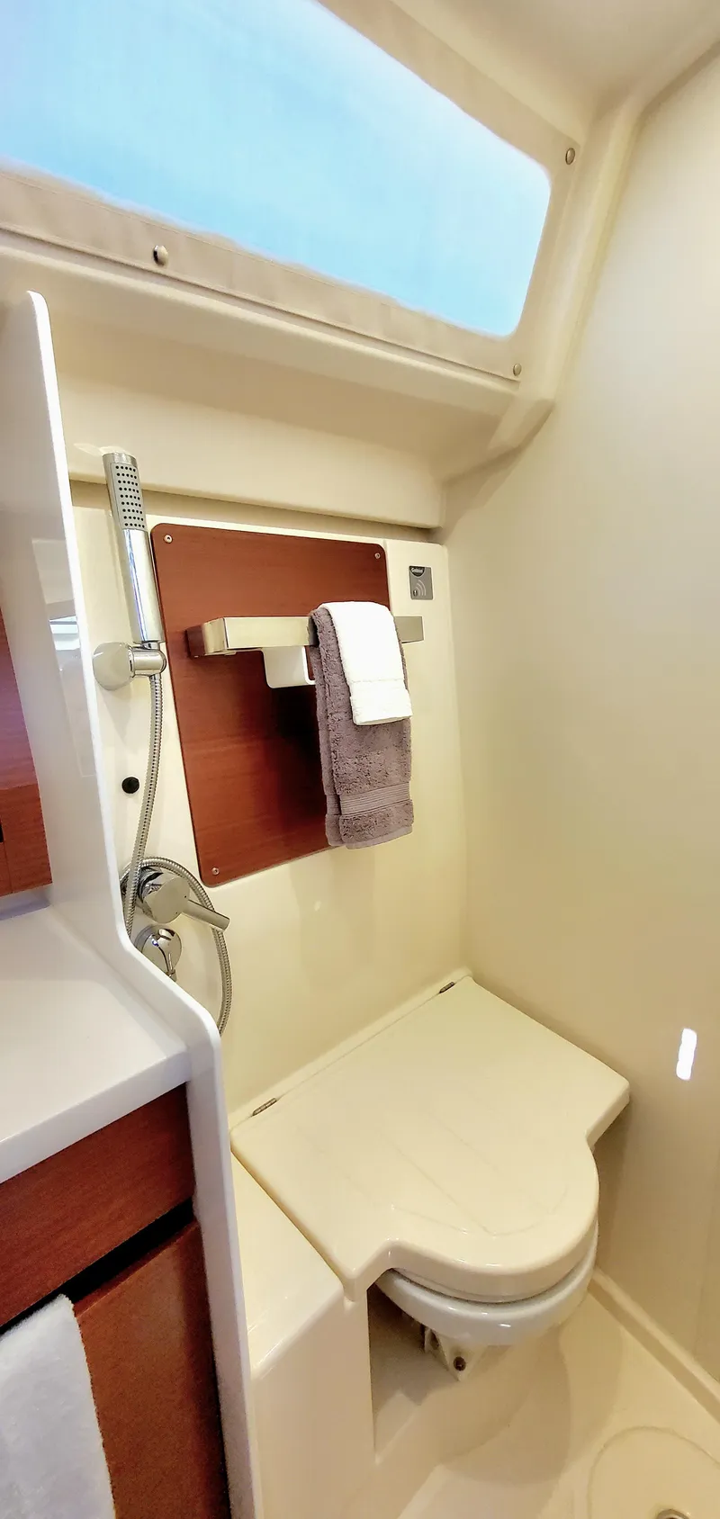 Slide: The Image of 2024 Hanse 388 yacht bathroom with modern fixtures and natural lighting. - 24