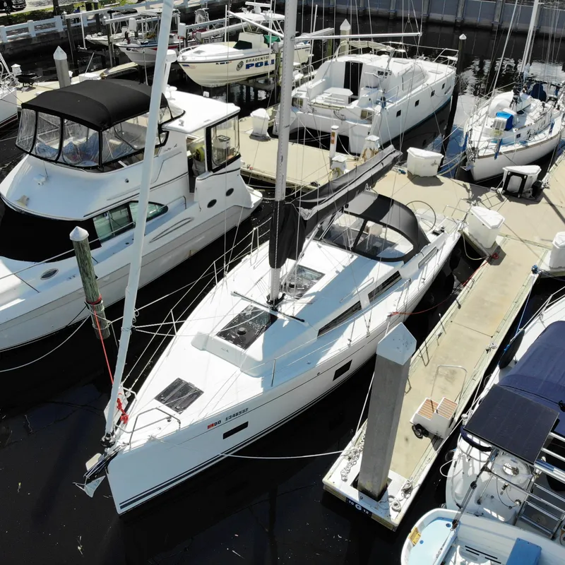 Slide: The Image of 2024 Hanse 388 sailboat docked at marina, aerial view. - 31