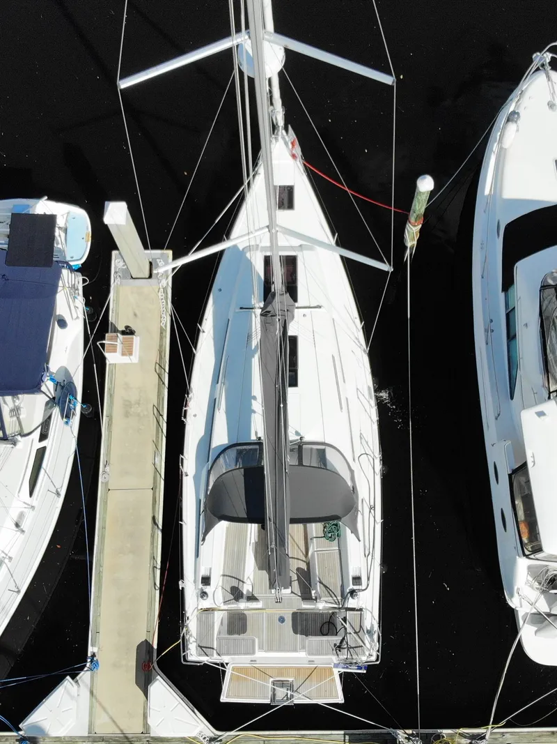 Slide: The Image of Aerial view of a 2024 Hanse 388 sailboat docked at a marina. - 6