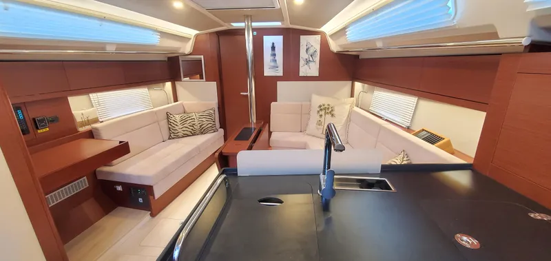 Slide: The Image of Luxurious interior of 2024 Hanse 388 yacht with modern furnishings and elegant design. - 7