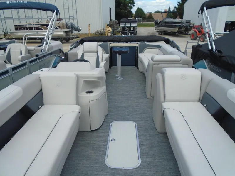 Slide: The Image of 2025 Godfrey Sweetwater 2286 SB pontoon boat with spacious seating and modern design. - 20