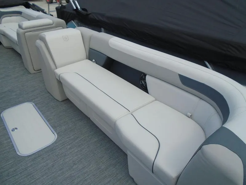 Slide: The Image of 2025 Godfrey Sweetwater 2286 SB boat interior with plush seating and modern design. - 22