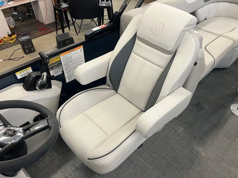 Slide: The Image of Luxurious captain's chair in 2025 Godfrey Sweetwater 2286 SB boat, featuring sleek design and comfort. - 6