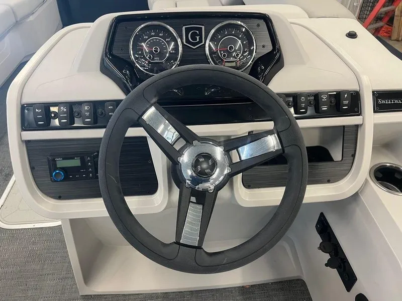 Slide: The Image of Steering console of 2025 Godfrey Sweetwater 2286 SB GTP pontoon boat. - 7