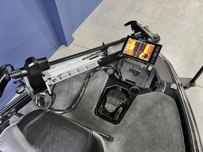 Slide: The Image of 2025 Skeeter FXR20 PRO boat dashboard with advanced navigation system and controls. - 11