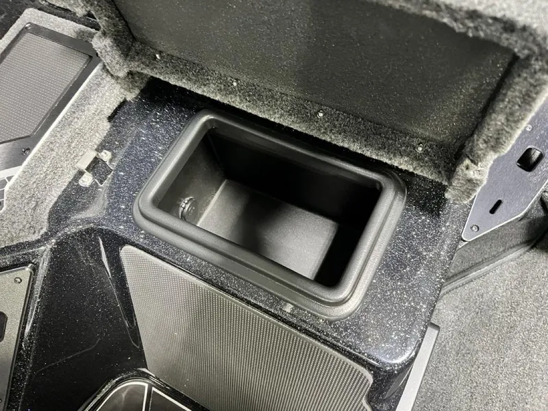 Slide: The Image of 2025 Skeeter FXR20 PRO boat storage compartment, open and empty. - 6