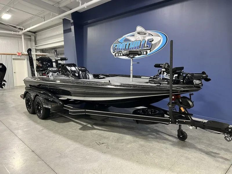 Slide: The Image of 2025 Skeeter FXR20 PRO fishing boat in showroom, featuring sleek design and advanced equipment. - 7