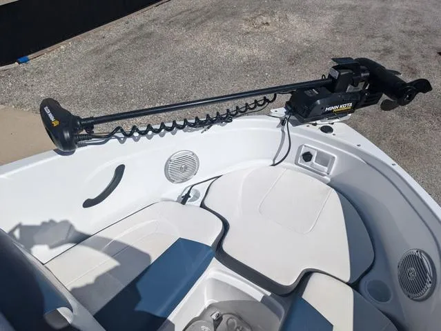 Slide: The Image of 2021 Tracker 450 TF boat with Minn Kota trolling motor on deck. - 15