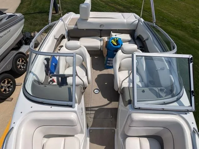 Slide: The Image of 2007 Crownline 190 SS boat interior with white seating and open windshield. - 8