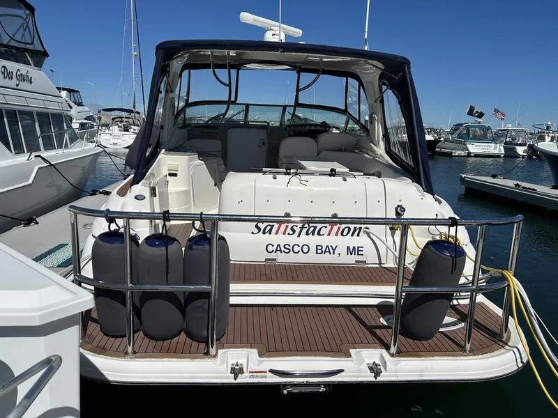 Slide: The Image of 2010 Larson Cabrio 370 boat docked at Casco Bay marina. - 13