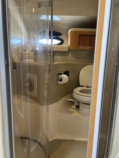 Slide: The Image of 2010 Larson Cabrio 370 bathroom interior with shower and toilet. - 3