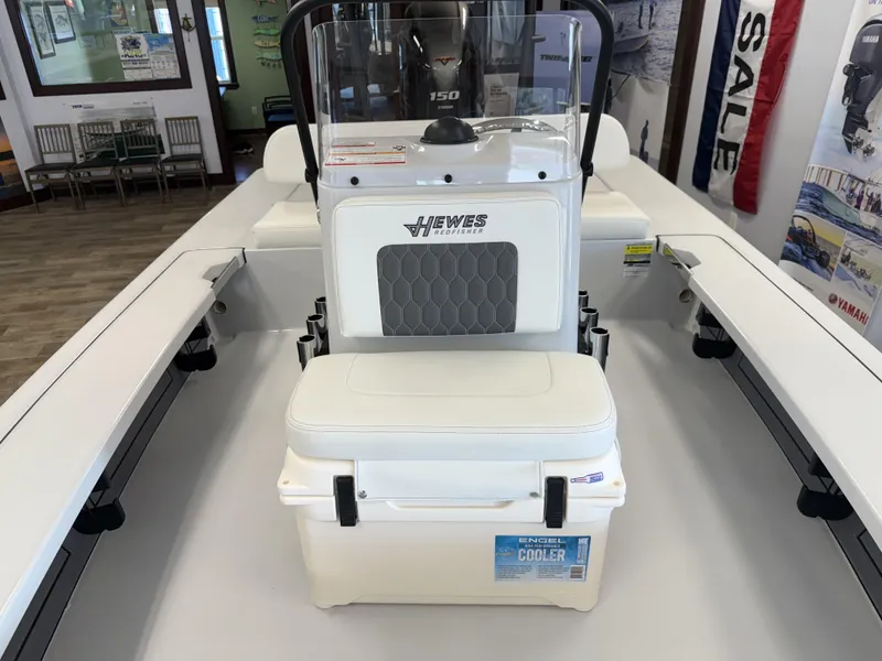 Slide: The Image of 2025 Hewes 18 Redfisher boat interior with Engel cooler and Yamaha engine display. - 9