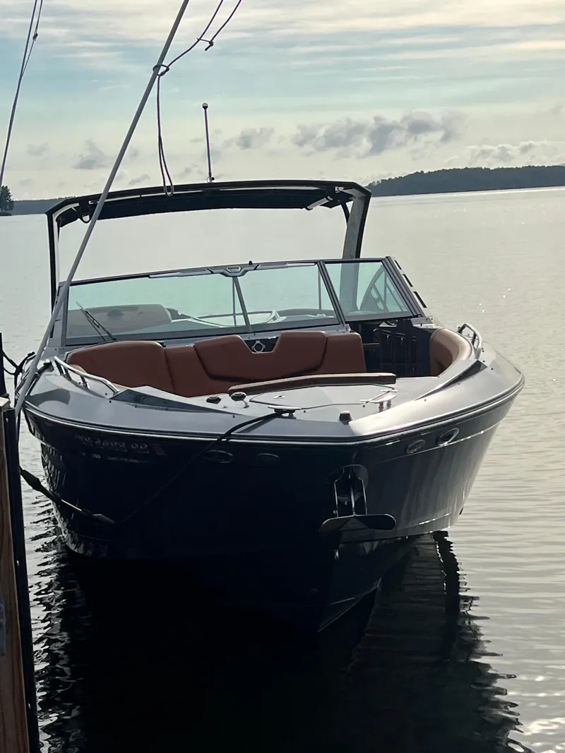 Slide: The Image of 2016 Cruisers Yachts 338 SOUTH BEACH boat docked on calm water. - 4