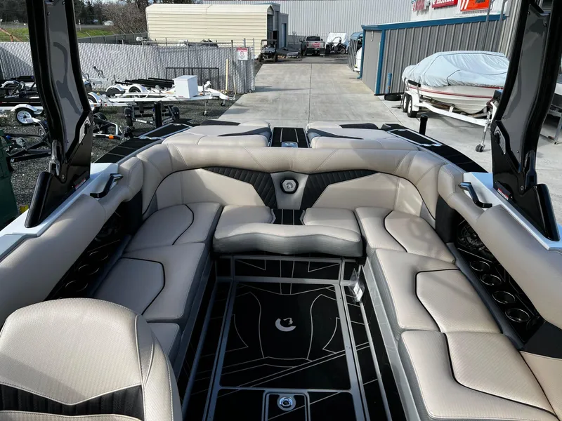 Slide: The Image of 2024 Centurion Fi23 boat interior with luxurious seating and modern design. - 10