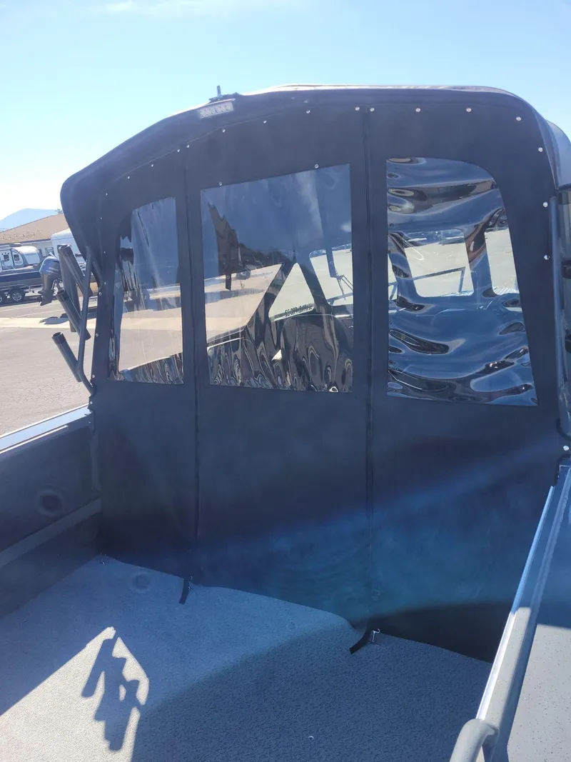 Slide: The Image of 2024 Boulton Powerboats Sentinel Pro 22 interior with protective canopy. - 9
