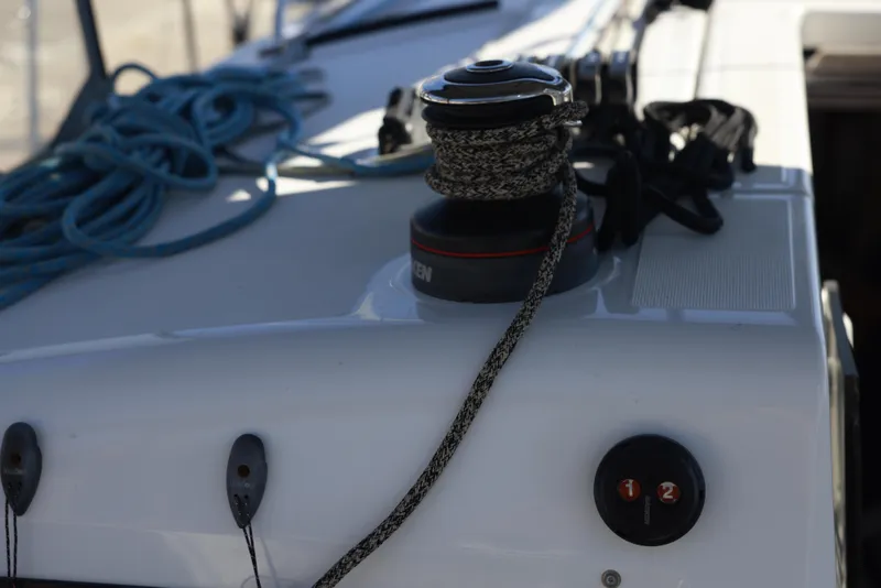 Slide: The Image of Deck of 2022 Jeanneau Sun Odyssey 410 with winch and ropes. - 14