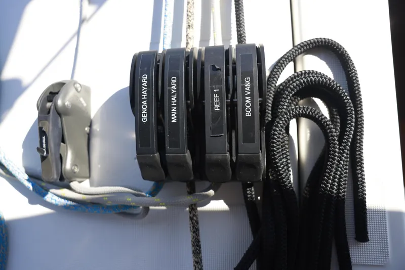 Slide: The Image of Jeanneau Sun Odyssey 410 sailboat rigging lines and cleats, 2022 model. - 16