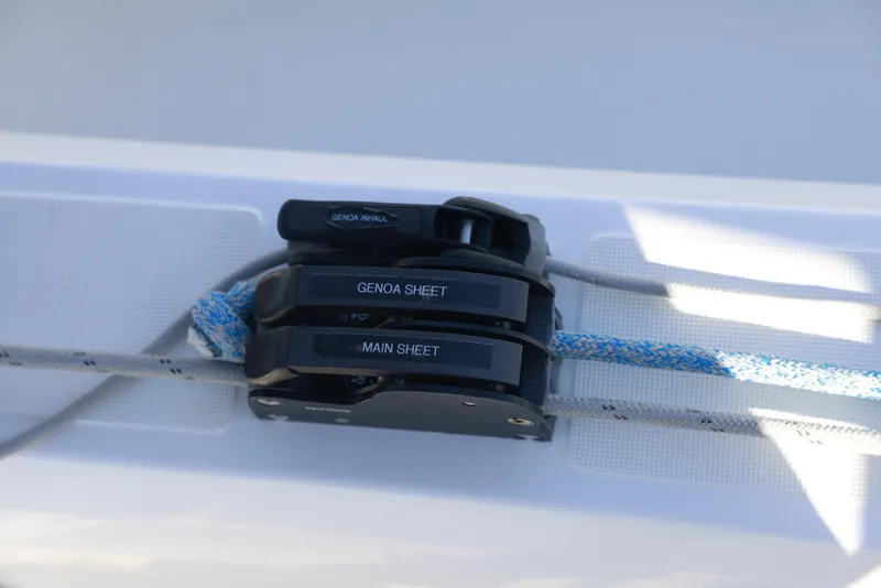 Slide: The Image of Jeanneau Sun Odyssey 410 sailboat rigging, featuring genoa and main sheet controls, 2022 model. - 19