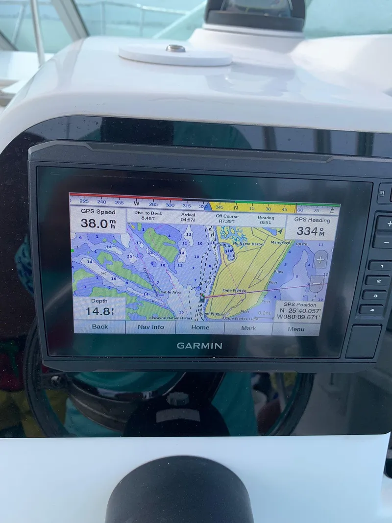 Slide: The Image of Garmin GPS display on 2000 Robalo 2640 Walkaround boat dashboard. - 14
