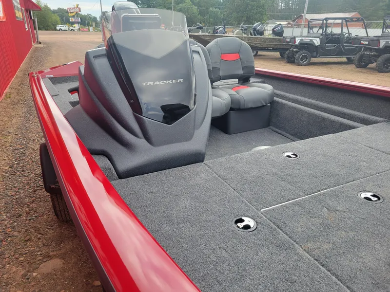 Slide: The Image of 2025 Tracker Pro Team 175 Crappie Edition boat with red and gray interior. - 6