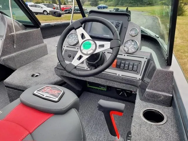 Slide: The Image of 2024 Ranger VS1782SC Angler boat interior with steering wheel and dashboard controls. - 3